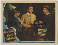 8k409 BACK STREET LC 1941 c/u of Charles Boyer & Margaret Sullavan look at woman holding roses!