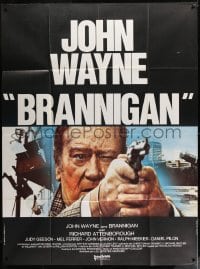 9f658 BRANNIGAN French 1p 1975 different close up of John Wayne aiming his gun in England!