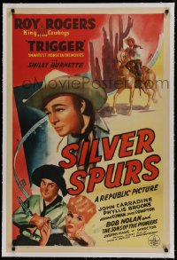 9h162 SILVER SPURS linen 1sh 1943 art of Roy Rogers close up & riding Trigger, plus Smiley Burnette!