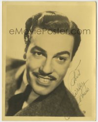 1b368 CESAR ROMERO signed deluxe 6x7 still 1940s great head & shoulders portrait in suit & tie!