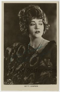 1b680 BETTY COMPSON signed English 4x6 postcard 1920s great portrait with huge fan & pearl necklace!
