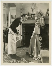 1h073 AFTER OFFICE HOURS 8x10.25 still 1935 Harvey Stephens bows to Constance Bennett by fireplace!