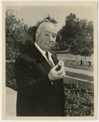 1h077 ALFRED HITCHCOCK 8.25x10 still 1961 the legendary director holding a golf ball at a course!