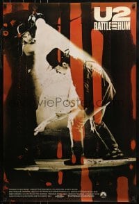 1z956 U2 RATTLE & HUM int'l 1sh 1988 great image of rockers Bono & The Edge performing on stage!