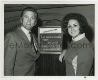 2a249 BROTHERHOOD candid 8.25x10 still 1968 c/u of Kirk Douglas posing with TWA ground hostess!