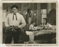 2a291 CIMARRON 8x10.25 still 1931 Irene Dunne in bed looks worried at Richard Dix with guns drawn!