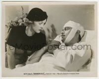2a338 DANGEROUS 8x10.25 still 1935 Bette Davis looks at injured John Eldrdge with those eyes!