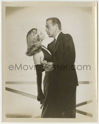 2a358 DEAD RECKONING 8.25x10.25 still 1947 Humphrey Bogart embracing sexy Lizabeth Scott with gun!