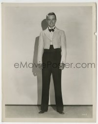 2a608 LEW AYRES 8x10.25 still 1930s full-length & smiling, wearing a white linen mess jacket!