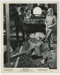 2a686 MODESTY BLAISE 8.25x10 still 1966 sexy Monica Vitti stands over unconscious guys on floor!