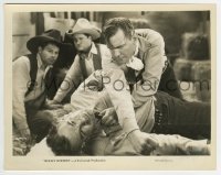 2a791 ROCKY RHODES 8x10.25 still 1934 close up of tough cowboy Buck Jones beating up bad guy!