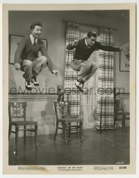 2a829 SINGIN' IN THE RAIN 8x10 still 1952 great image of Gene Kelly & Donald O'Connor in mid-air!