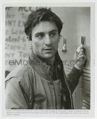 2a879 TAXI DRIVER 8.25x10 still 1976 c/u of Robert De Niro by his locker at work, Martin Scorsese