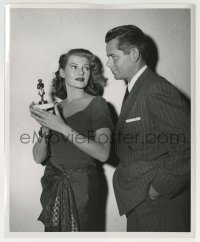 3m140 AFFAIR IN TRINIDAD 8.25x10 still sexy Rita Hayworth shows Glenn Ford her trophy by Lippman!