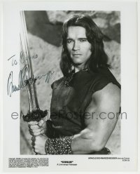 4t403 ARNOLD SCHWARZENEGGER signed 8x10 still 1982 best portrait w/sword in Conan the Barbarian!