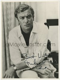 4t914 MICHAEL CAINE signed 6.5x8.5 REPRO 1970s great seated close up of the English star!