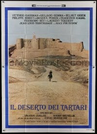 5a330 DESERT OF THE TARTARS Italian 2p 1976 cool far shot of soldier riding away from fortress!