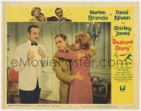 5h186 BEDTIME STORY LC #6 1964 David Niven watches Shirley Jones hold Marlon Brando faking it!