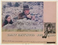 5h524 JOE KIDD LC #4 1972 Clint Eastwood with gun protecting Stella Garcia behind a rock!