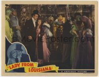 5h551 LADY FROM LOUISIANA LC 1941 John Wayne in top hat & tails w/ pretty Ona Munson at Mardi Gras!