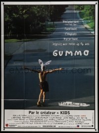 5j768 GUMMO French 1p 1997 wacky image of half-naked man on skateboard & wearing bunny hat!