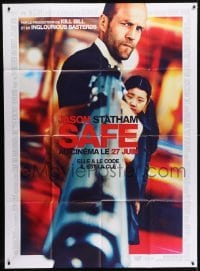 5j915 SAFE advance French 1p 2012 great super close up of Jason Statham's gun, she is the key!