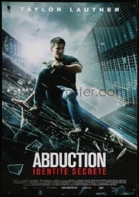 5p034 ABDUCTION Swiss 2011 great image of Taylor Lautner sliding down side of building!