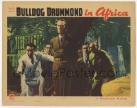 5r302 BULLDOG DRUMMOND IN AFRICA LC 1938 H.B. Warner tied to a tree surrounded by bad guys!