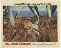 5r797 SEA CHASE LC #1 1955 John Wayne & Lana Turner walking through high grass on an island!