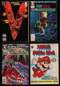 6h353 LOT OF 4 COMIC BOOKS 1980s The Real Ghostbusters, Super Mario Bros., The Visitors