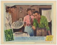 6m024 AFRICAN QUEEN LC #4 1952 Katharine Hepburn watches Humphrey Bogart explain himself to officer!
