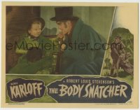 6m087 BODY SNATCHER LC 1945 close up of creepy Boris Karloff in top hat with Sharyn Moffett!