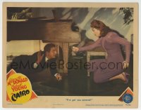 6m110 CAIRO LC 1942 Jeanette MacDonald with gun has scared Robert Young cornered under piano!
