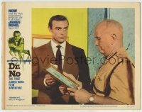 6m311 DR. NO LC #7 1962 close up of Sean Connery as James Bond asking guard about a picture!