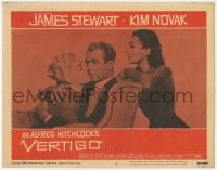6m949 VERTIGO LC #6 1958 Hitchcock, James Stewart hugs blonde Kim Novak with brunette Kim behind!