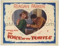 6m952 VOICE OF THE TURTLE LC #7 1948 c/u of Ronald Reagan helping Eleanor Parker zip up her dress!