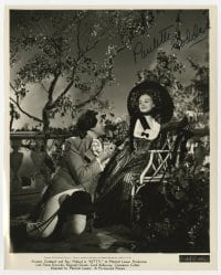 6s486 PAULETTE GODDARD signed 8x10 still 1945 being romanced by Patric Knowles in Kitty!