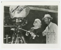 6s975 THOMAS CARR signed 8x10 REPRO still 1980s great candid image of the director by camera!