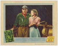 7c277 AFRICAN QUEEN LC #3 1952 Humphrey Bogart & Katharine Hepburn on boat drenched in the rain!
