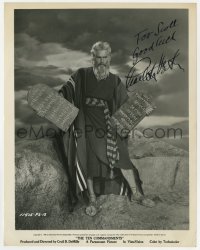 7s385 CHARLTON HESTON signed 8x10.25 still 1956 as Moses holding tablets from The Ten Commandments!