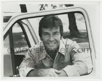 7s885 DICK CLARK signed 8x10 REPRO 1980s great close portrait posing behind his truck window!