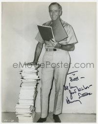 7s467 HENRY FONDA signed 8x10.25 still 1968 candid by a pile of scripts, Yours, Mine & Ours!