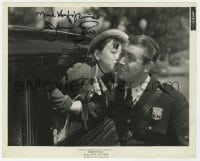 7s483 JANE WITHERS signed 8x10 still 1935 the child star kissing policeman from Paddy O'Day!