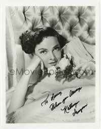 7s945 KATHRYN GRAYSON signed 8x10.25 REPRO still 1980s great close up laying in bed with roses!