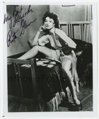 7s976 RITA GAM signed 8x9.75 publicity still 1980s showing her sexy legs & playing solitaire!