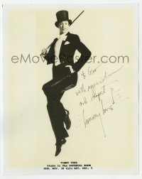 7s992 TOMMY TUNE signed 8x10 publicity still 1980s dancing in mid air with tuxedo, top hat & cane!