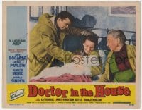 8d401 DOCTOR IN THE HOUSE LC #7 1955 English Dr. Dirk Bogarde happy after deliving baby!