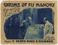 8d416 DRUMS OF FU MANCHU chapter 6 LC 1940 Henry Brandon examines man in box, Death Dials a Number!