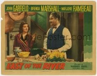 8d423 EAST OF THE RIVER LC 1940 George Tobias preparing meal by smoking Brenda Marshall in kitchen!