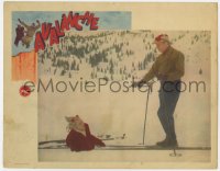 8j392 AVALANCHE LC 1945 wild image of man pointing gun at woman who fell while skiing!